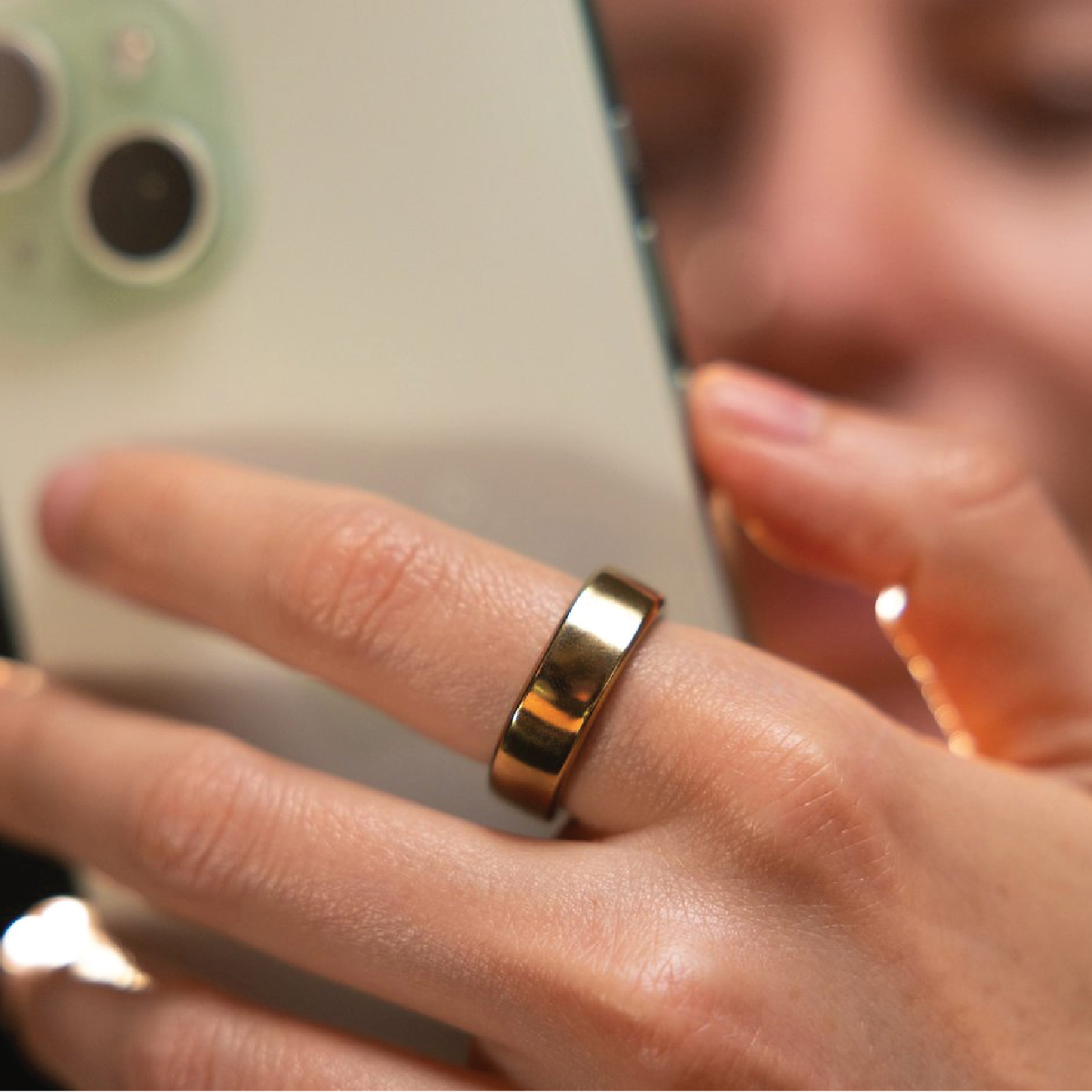 RingConn Gen 2 Smart Ring in Royal Gold worn on a finger