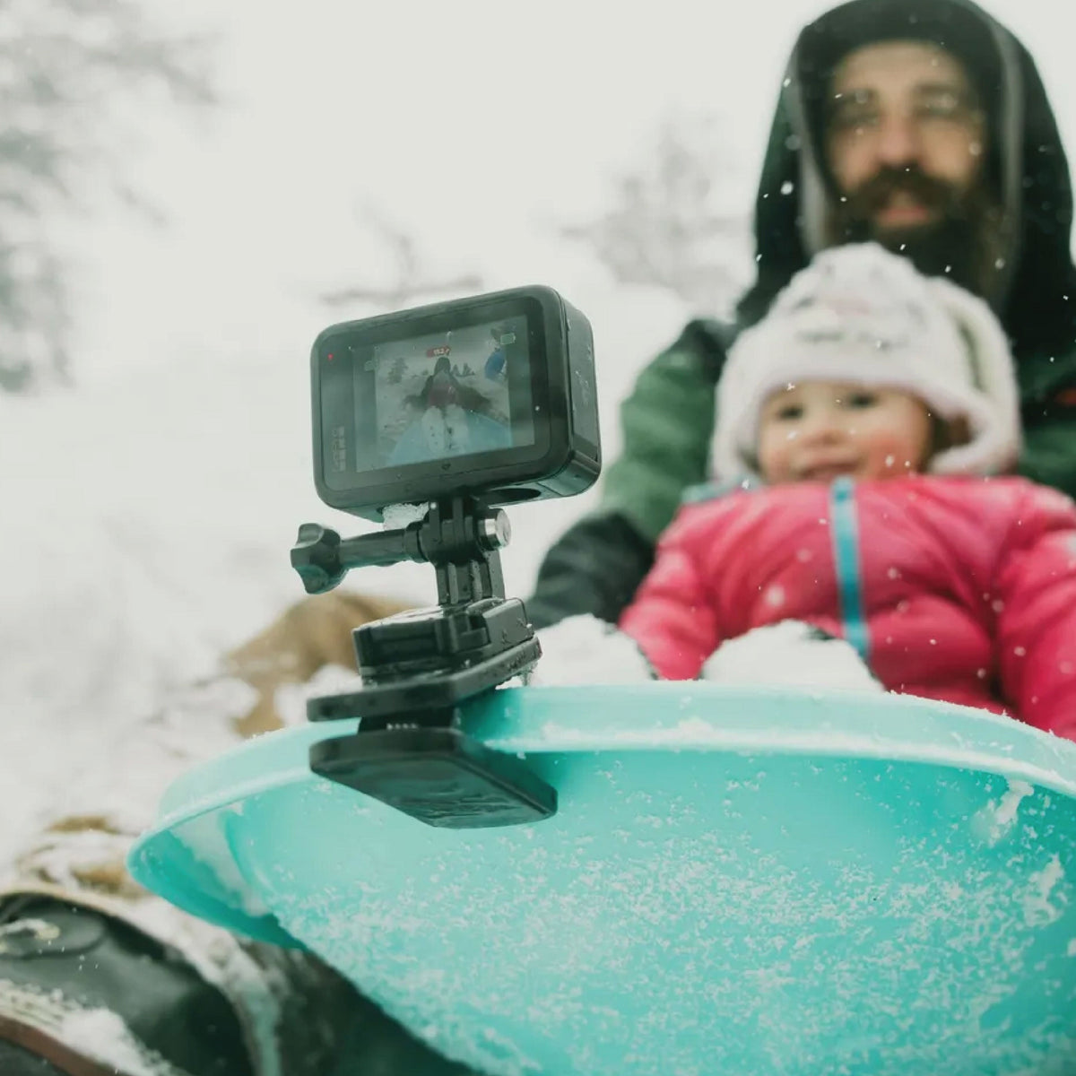 GoPro clipped on a snow board using the magnetic swivel clip