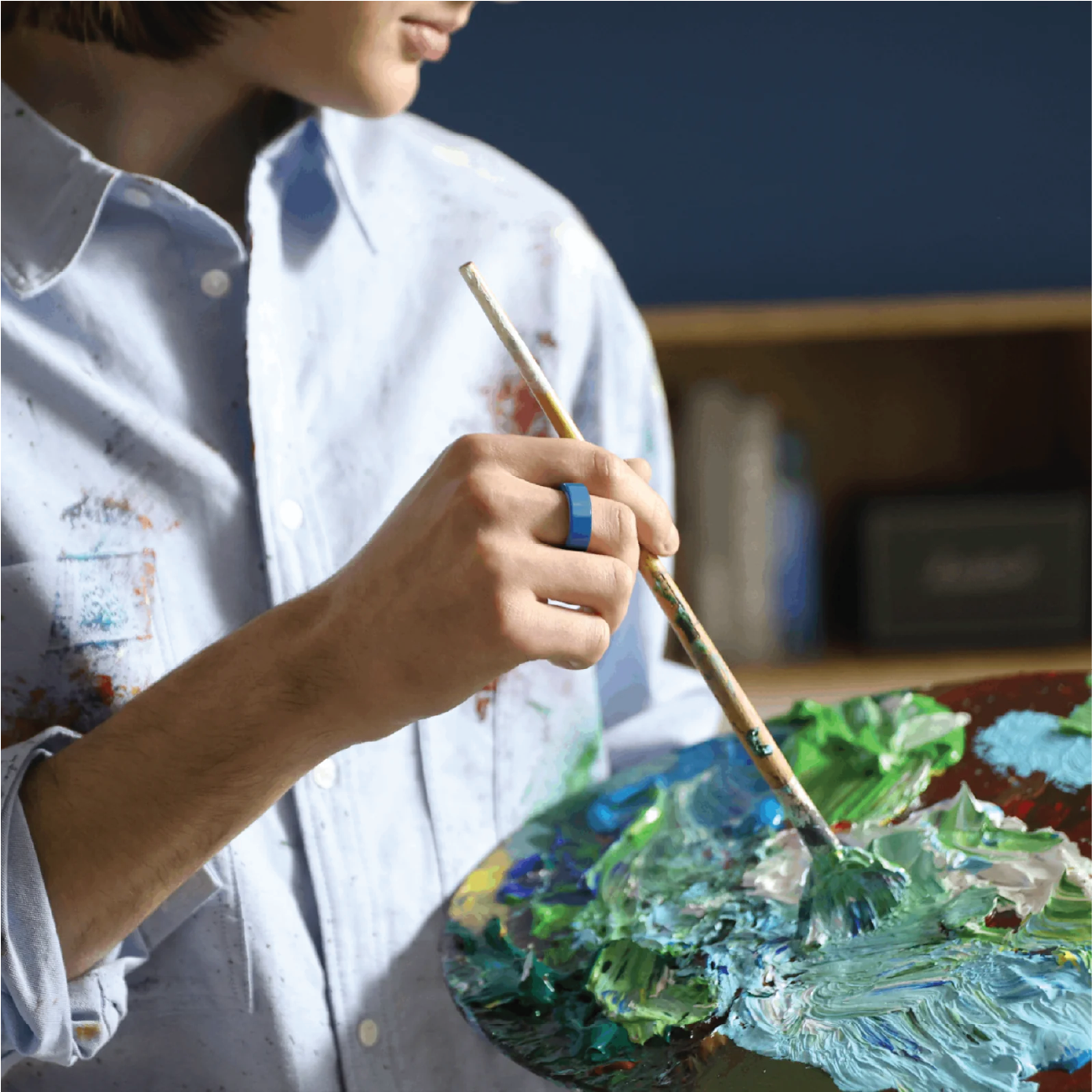 Person wearing RingConn Smart Ring with Multicolor Ring Protector.